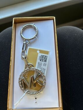 Michael Kors Silver tone keyfob w box. New